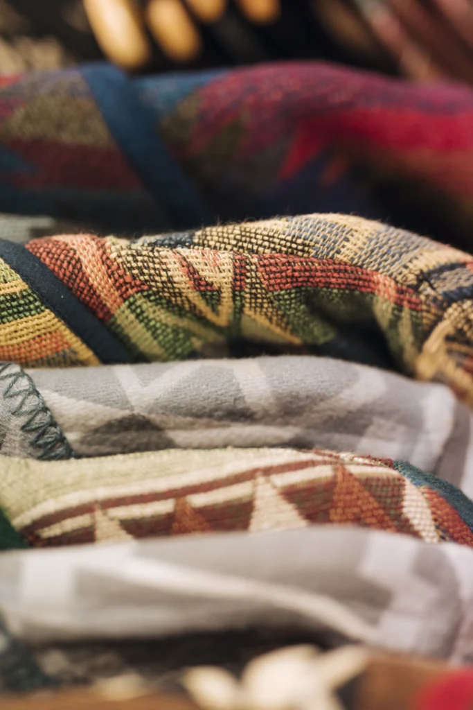 Creative Ideas for Using Fabric Decorative Accents in Your Home: Affordable Styling Guide: Decorating 101 stack sweatshirts