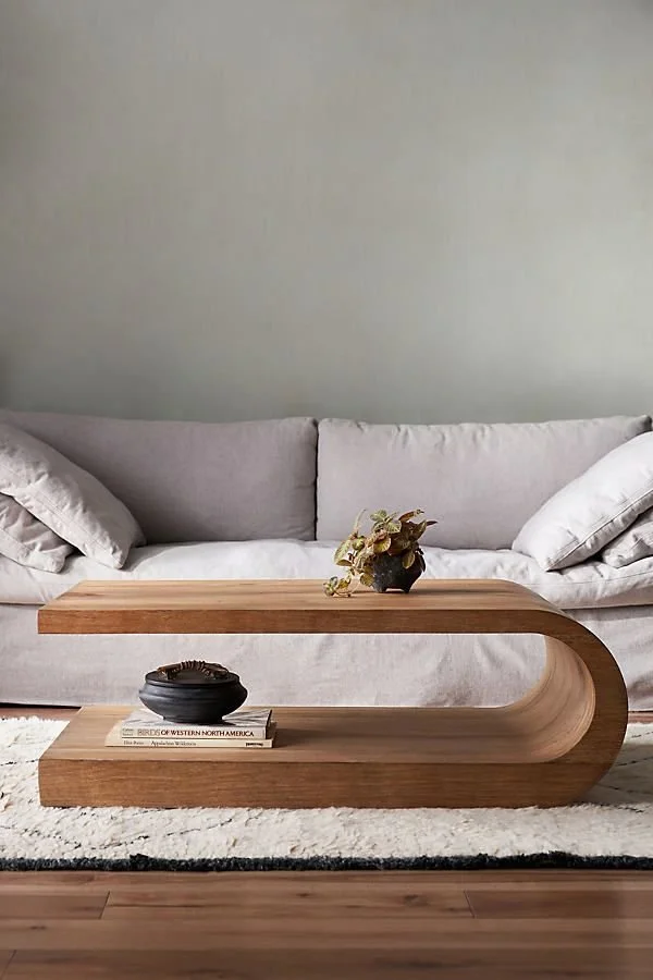 Palma Reclaimed Wood Sculptural Coffee Table showcasing unique design and craftsmanship.