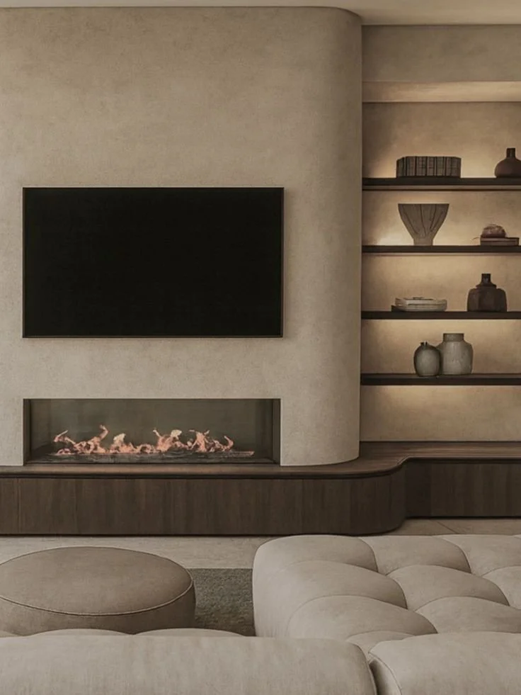 Cozy organic modern living room with comfortable seating and a TV setup.