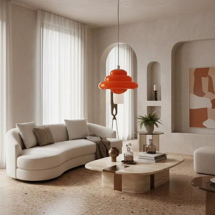 Cozy living room lighting featuring a stylish orange pendant light.